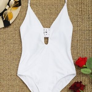 Never Worn. White Macrame one piece.